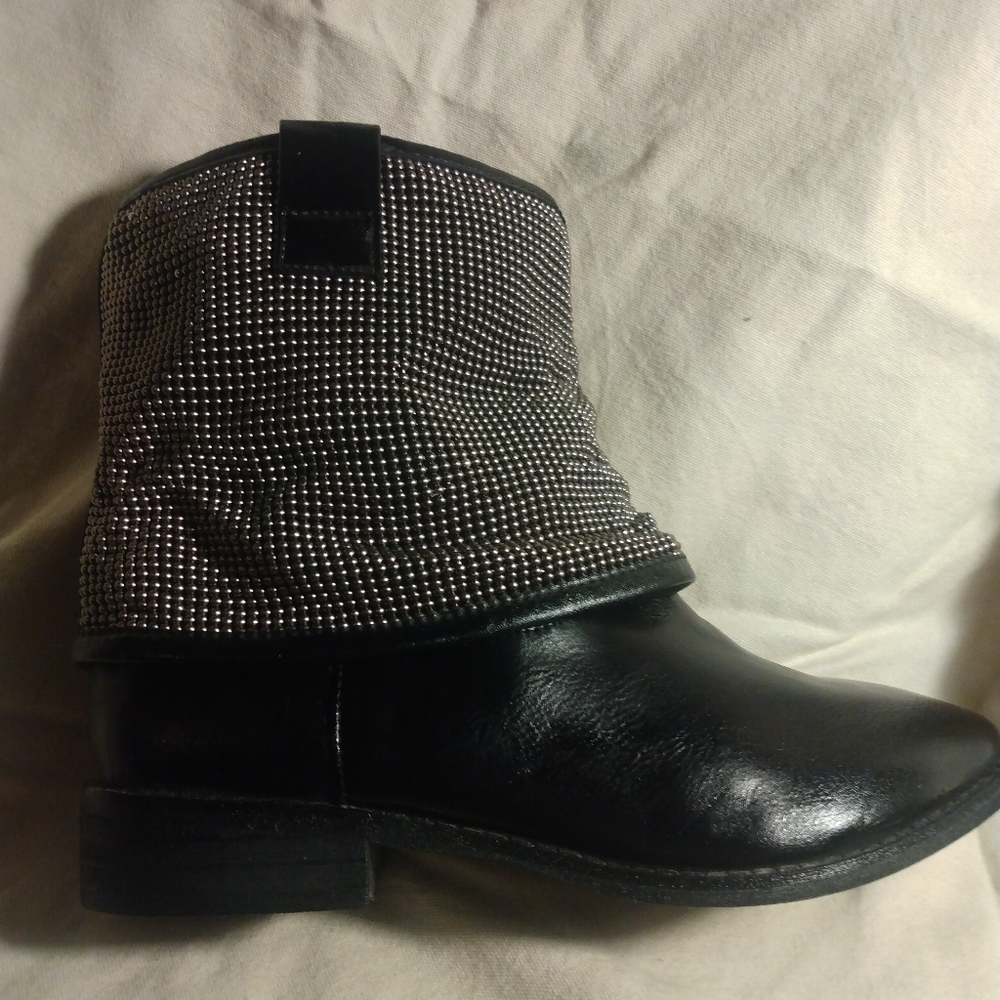 Black ankle boots with silver embellishments